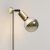 MAG-Y wall lamp with joint and hemispherical bulb
