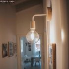 Fermaluce Wood, wooden wall lamp with curved extension