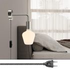 Spostaluce metal lamp with curved extension
