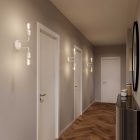 Fermaluce Metal, metal wall lamp with double curved extension