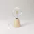 Table lamp with alder wood base and transparent bulb