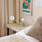Table lamp with alder wood base and transparent bulb