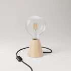 Table lamp with alder wood base and transparent bulb