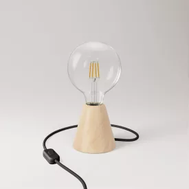 Table lamp with alder wood base and transparent bulb