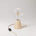 Table lamp with alder wood base and transparent bulb