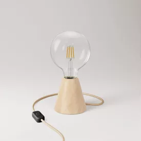 Table lamp with alder wood base and transparent bulb