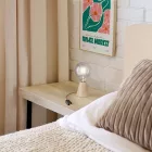 Table lamp with alder wood base and transparent bulb