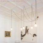 Decentraliser, ceiling or wall-mounted "V" hook for fabric electrical cables