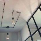 Decentraliser, ceiling hook for fabric electrical cables, with stopper