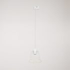 Suspended lamp with transparent conical Ghost bulb on rail