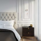 Fermaluce Metal wall lamp with curved extension and suspended lamp holder