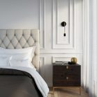 Fermaluce Metal wall lamp with curved extension and suspended lamp holder